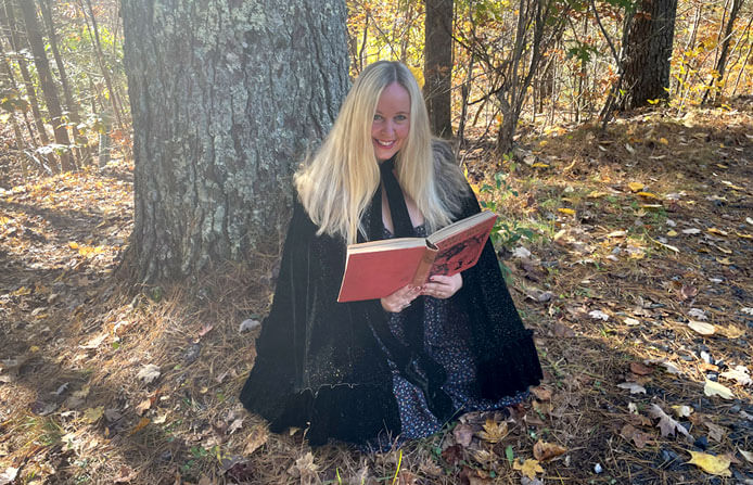 seren bertrand reading in the woods